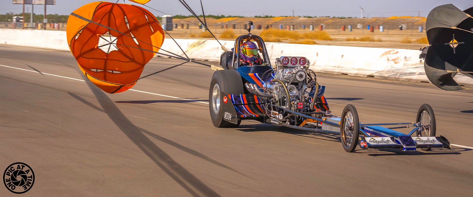 The Cone Killer with its orange parachute deployed